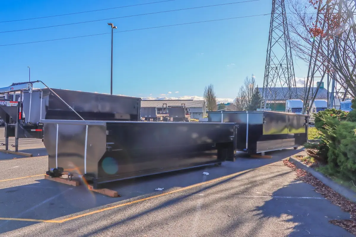 Roll-off dumpster ready for waste disposal at job site for 6 Yard Dumpster Rental in Heathrow